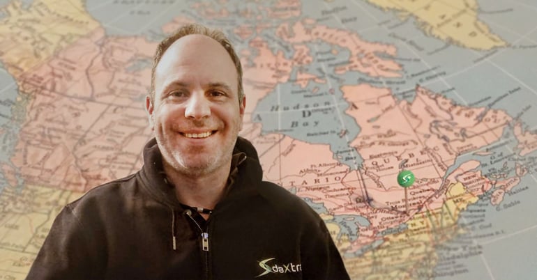 BJ Blumenthal, DaXtra's new Canada Country Manager in front of a map of Canada